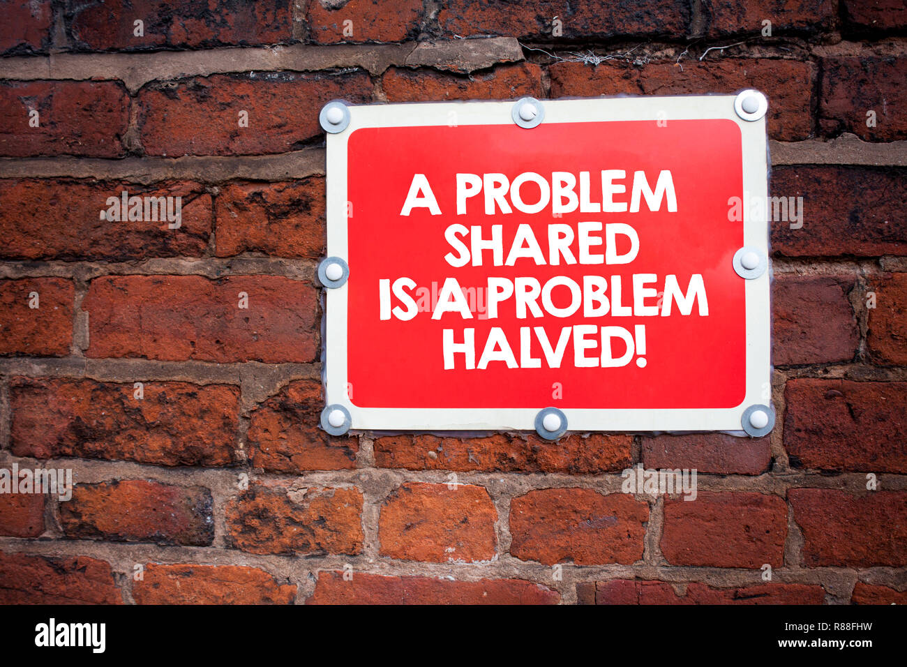 A problem shared is a problem halved hi-res stock photography and ...