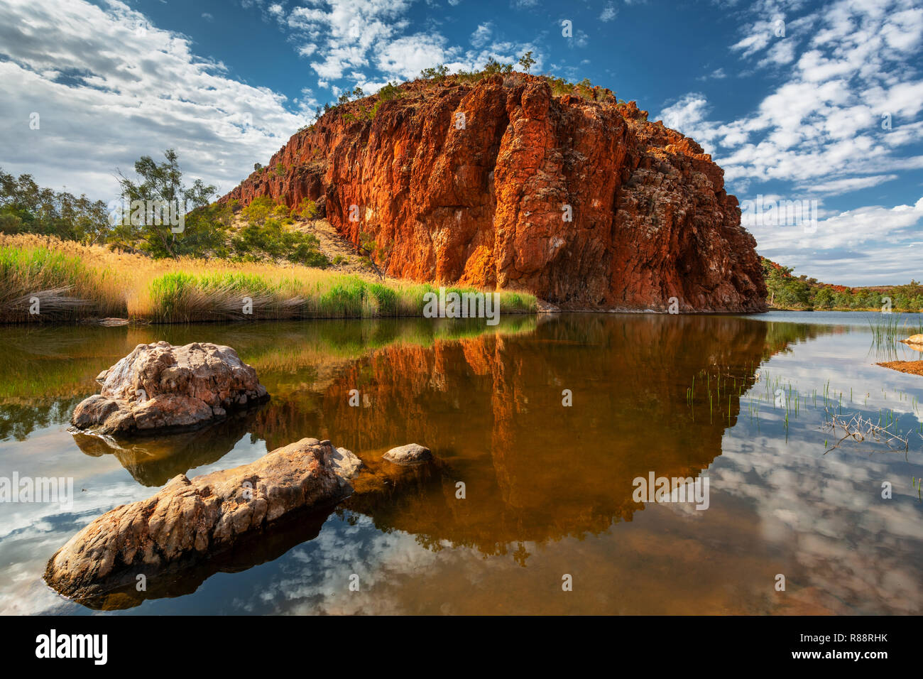 Reflections of Glen Helen Gorge in the amazing MacDonnell Ranges. Stock Photo