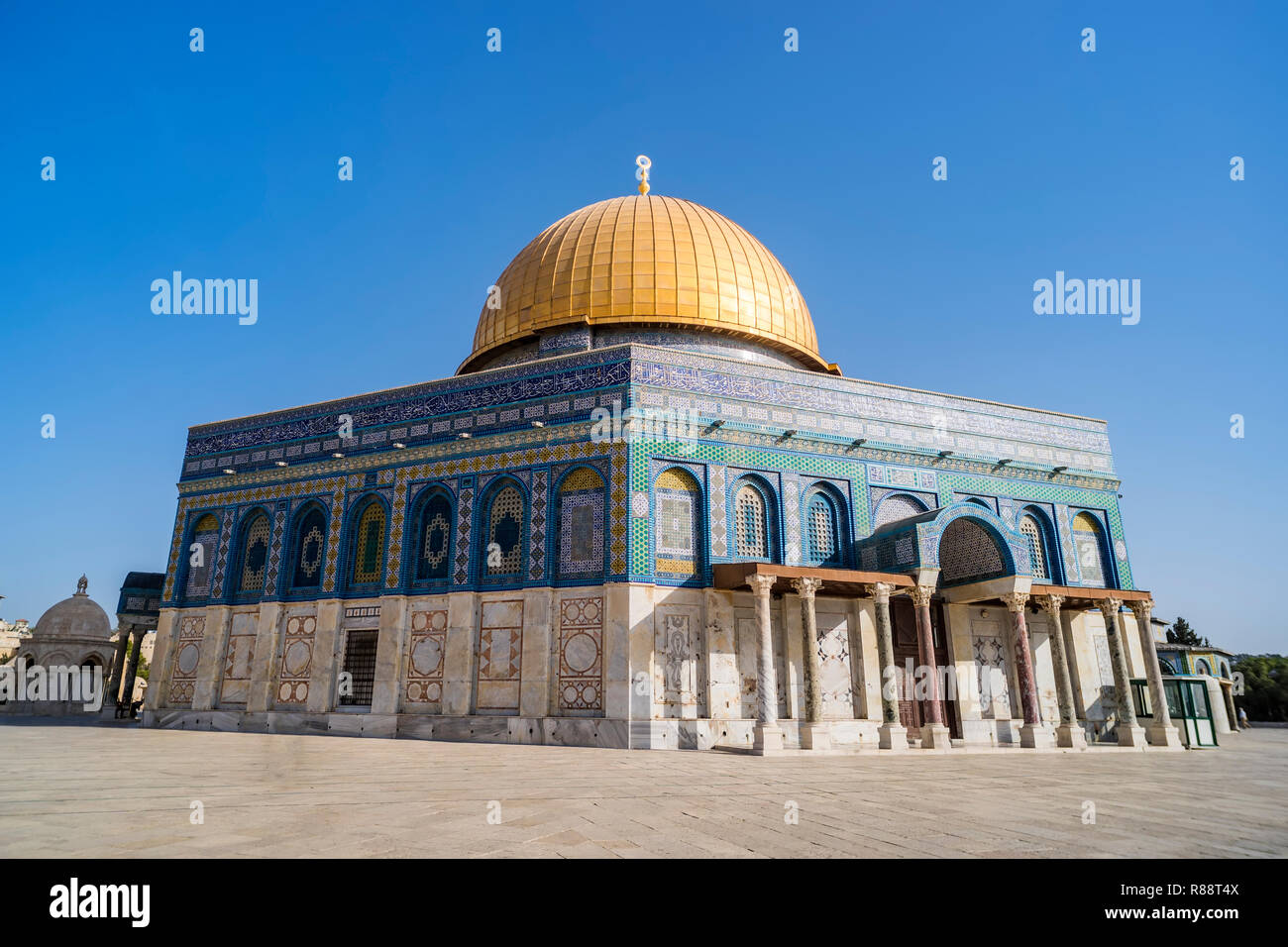 The Dom of Rock on the Temple Mount in the Old City. Dome was constructed by the order of Umayyad Caliph Abd al-Malik 689 and 691 and tiled by sultan  Stock Photo
