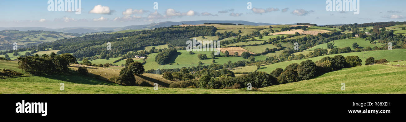 UK rural landscape. Panoramic view from Stonewall Hill (near Knighton, Powys) towards the distant Black Mountains Stock Photo