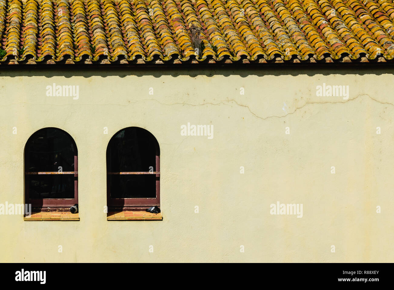 House with tile roof and two Windows Spain Stock Photo Alamy