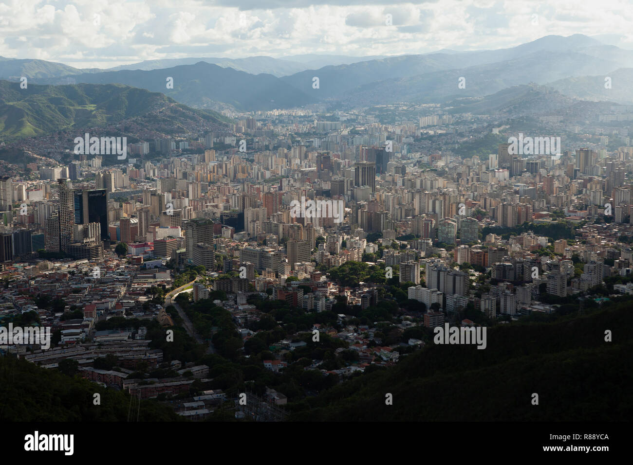 Elevated cityscape and mountains beyond, Caracas, Venezuela, South America Stock Photo