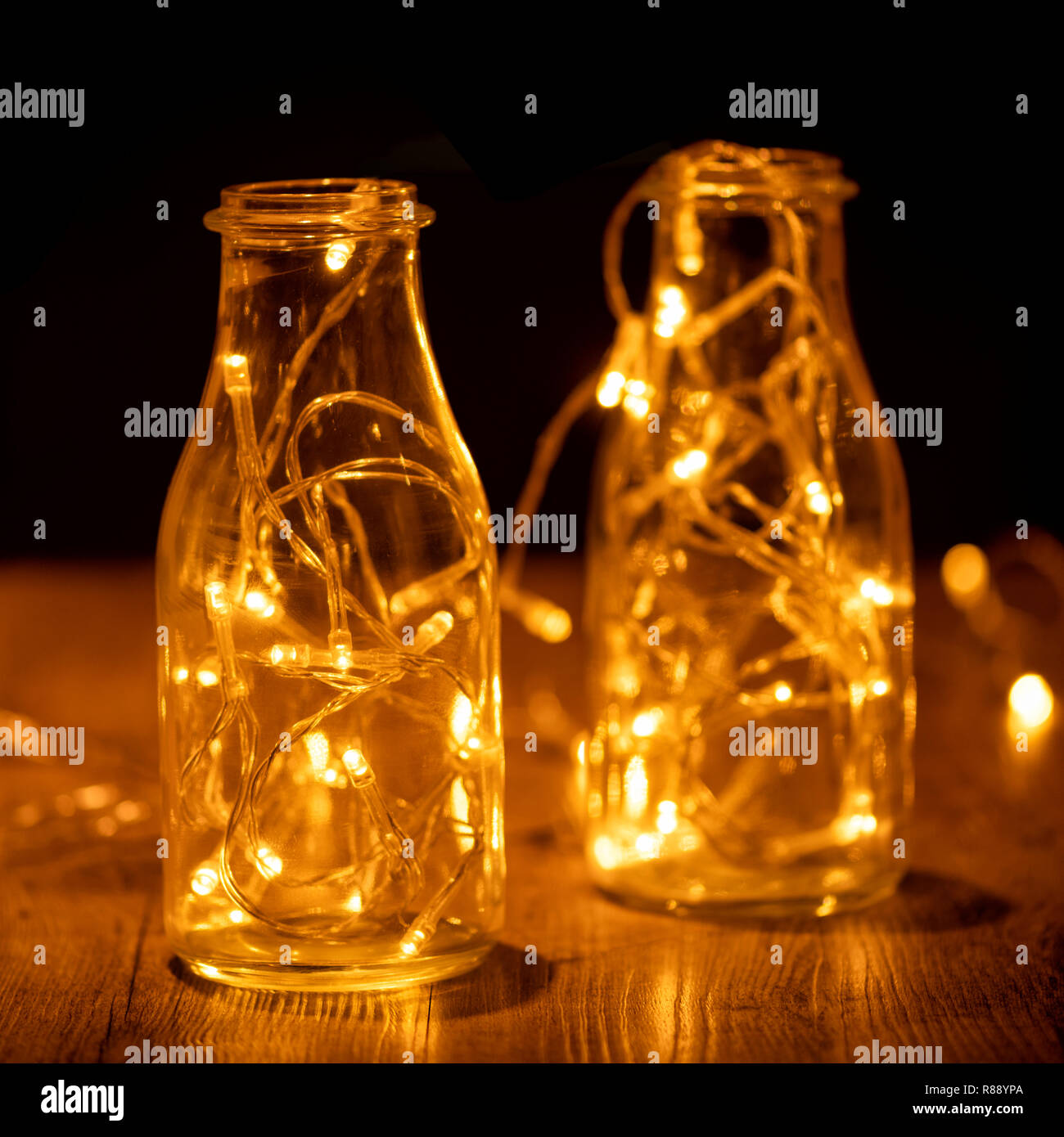 glass jars with fairy lights Stock Photo Alamy