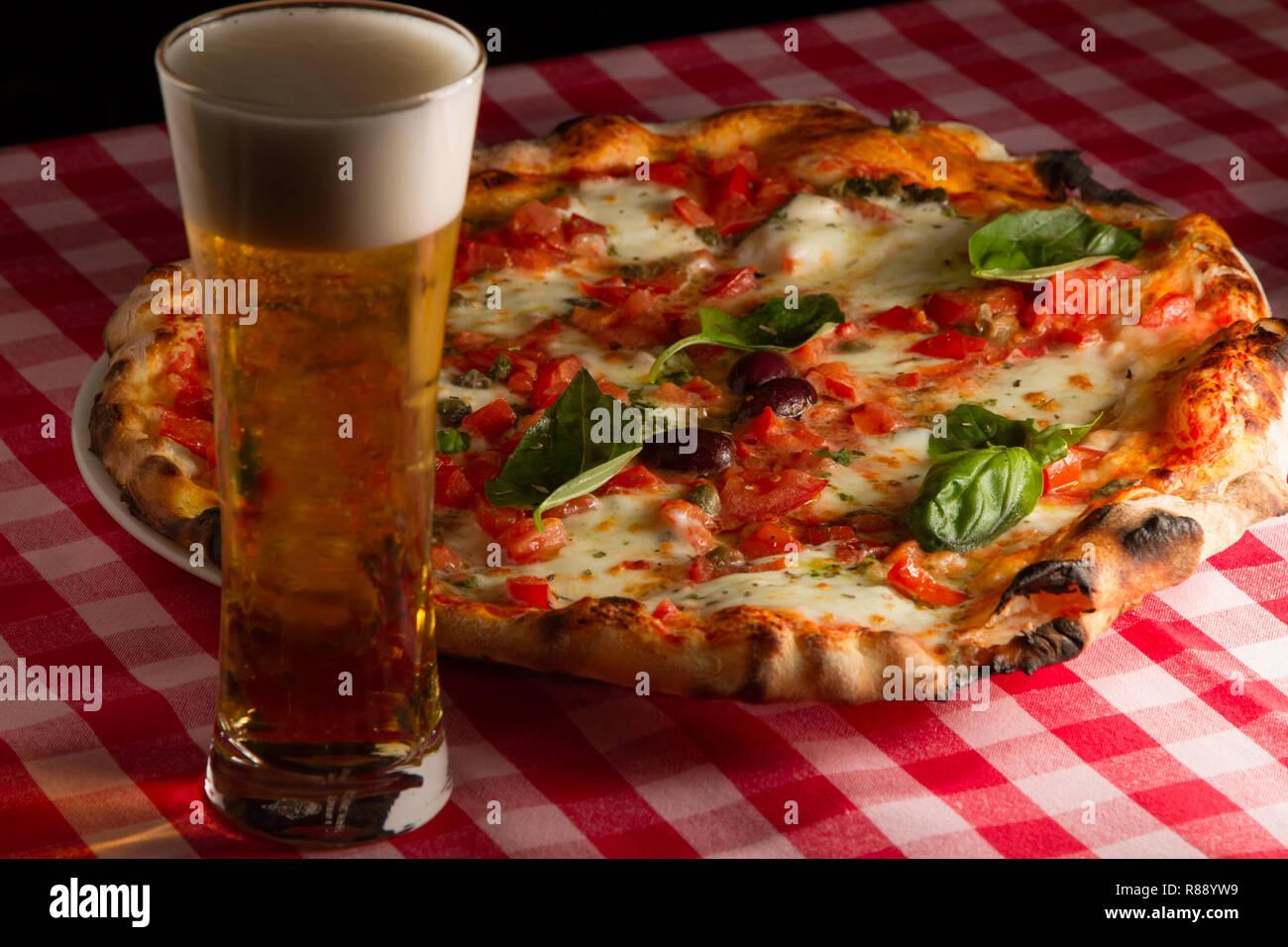 Rustic wood fire baked Pizza Margarita real italian look with tomato