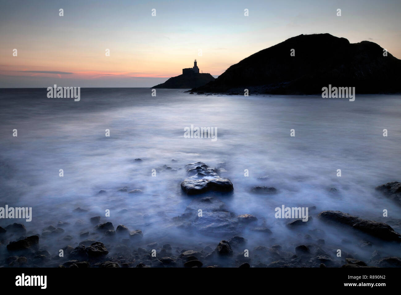 Mumbles lighthouse in silhouette Stock Photo