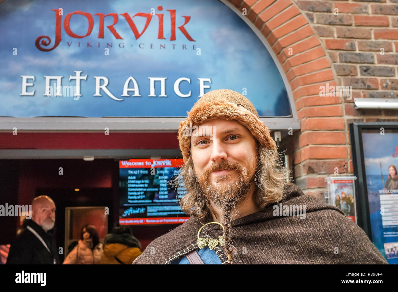 An actor dressed as a Viking outside the Jorvik Centre in York Stock Photo