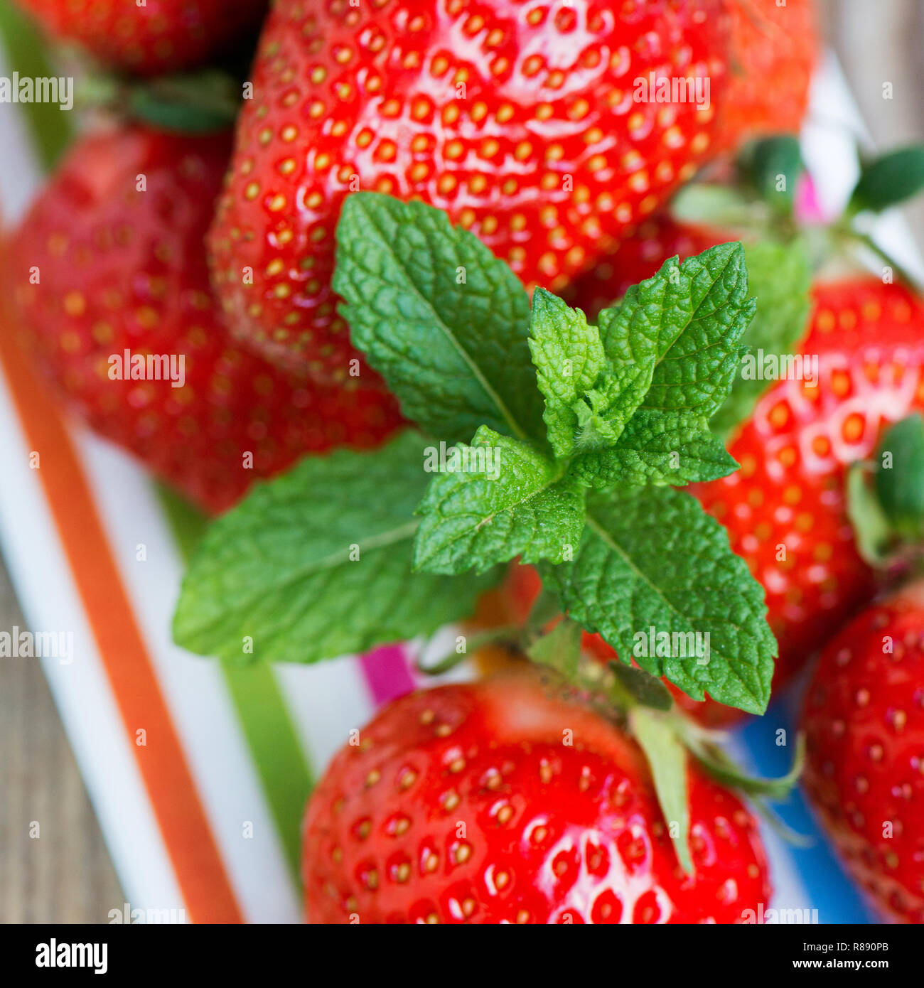 Fresh strawberries on wooden background Stock Photo - Alamy