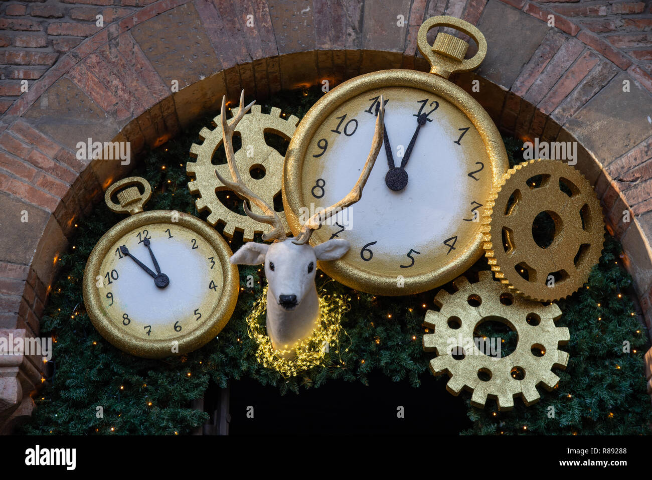 Decoration party for the end of the year, midnight minus five minutes.  Wooden clocks decorated as decorations for the holidaysas decorations Stock  Photo - Alamy