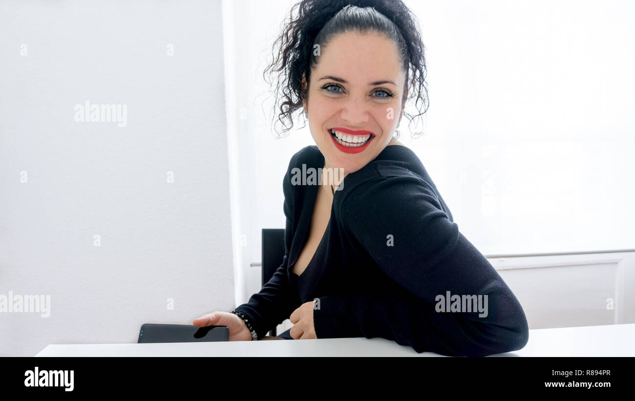 Portrait Of A Beautiful Normal Woman Using Her Mobile Phone And