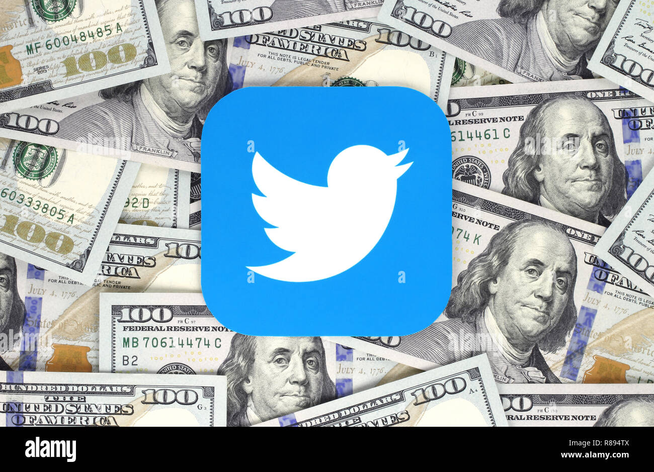 Kiev, Ukraine - September 07, 2018: Twitter icon printed on paper and placed on money background. Twitter is an American online news service Stock Photo