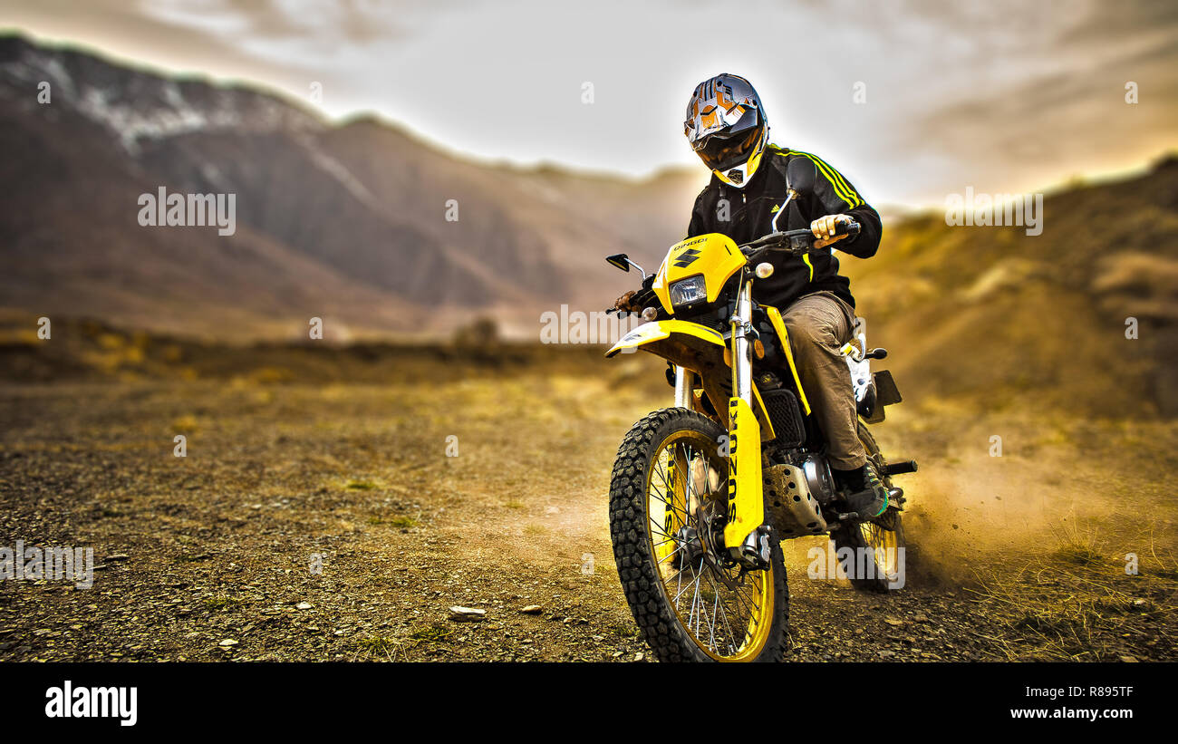 Motor cyclist in the nature Stock Photo