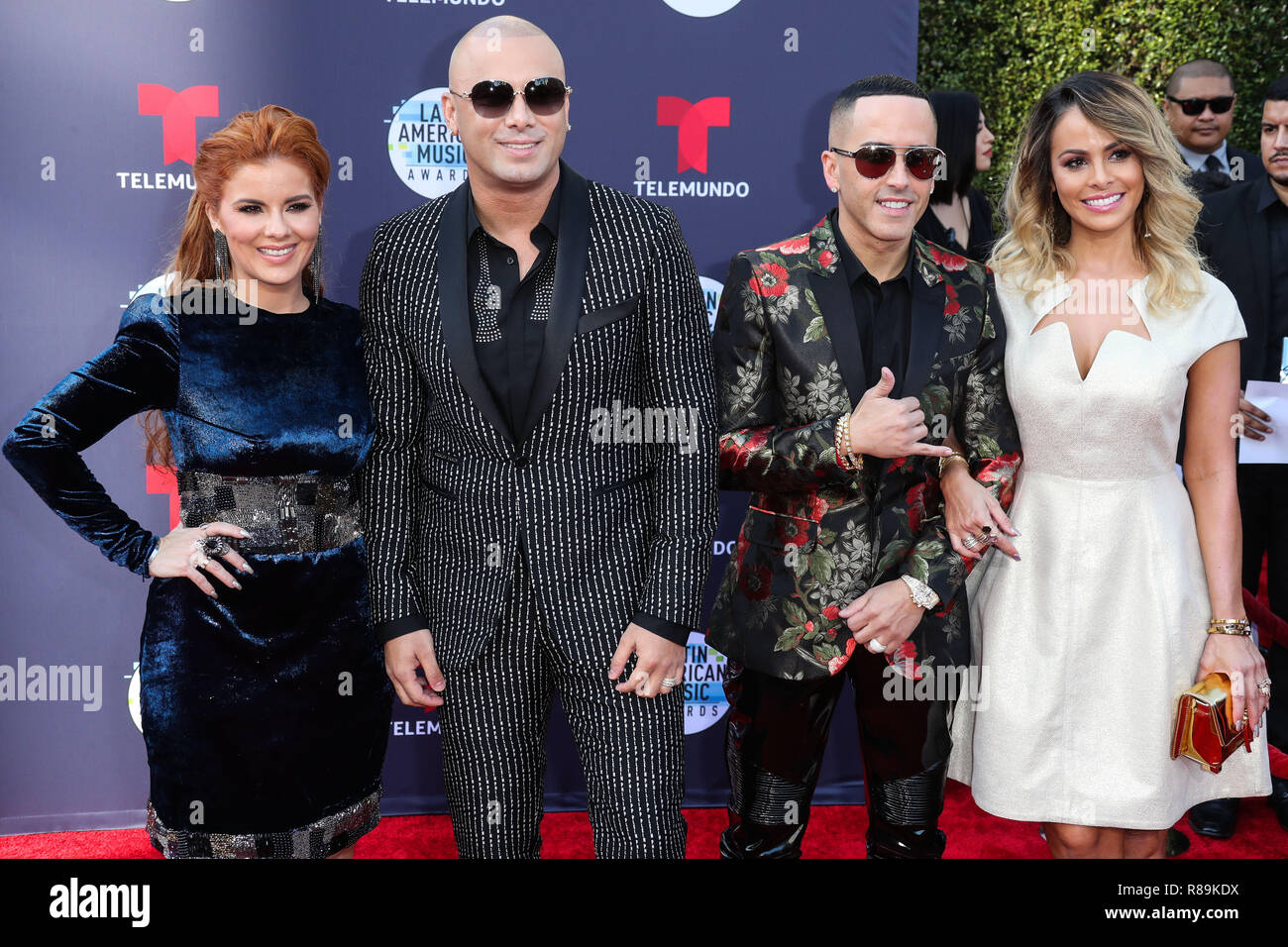 HOLLYWOOD, LOS ANGELES, CA, USA - OCTOBER 25: Yomaira Ortiz Feliciano, Wisin, Yandel, Edneris Espada Figueroa, Wisin Y Yandel at the 2018 Latin American Music Awards held at the Dolby Theatre on October 25, 2018 in Hollywood, Los Angeles, California, United States. (Photo by Xavier Collin/Image Press Agency) Stock Photo