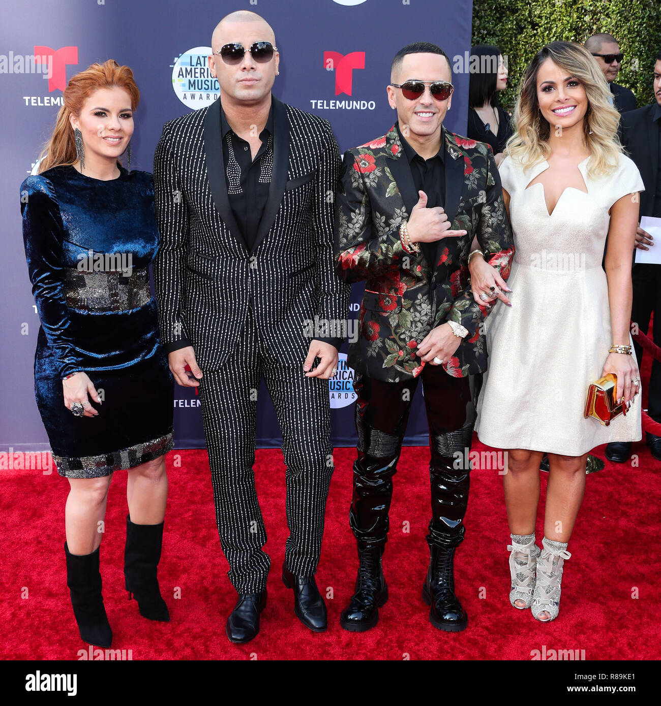 HOLLYWOOD, LOS ANGELES, CA, USA - OCTOBER 25: Yomaira Ortiz Feliciano, Wisin, Yandel, Edneris Espada Figueroa, Wisin Y Yandel at the 2018 Latin American Music Awards held at the Dolby Theatre on October 25, 2018 in Hollywood, Los Angeles, California, United States. (Photo by Xavier Collin/Image Press Agency) Stock Photo