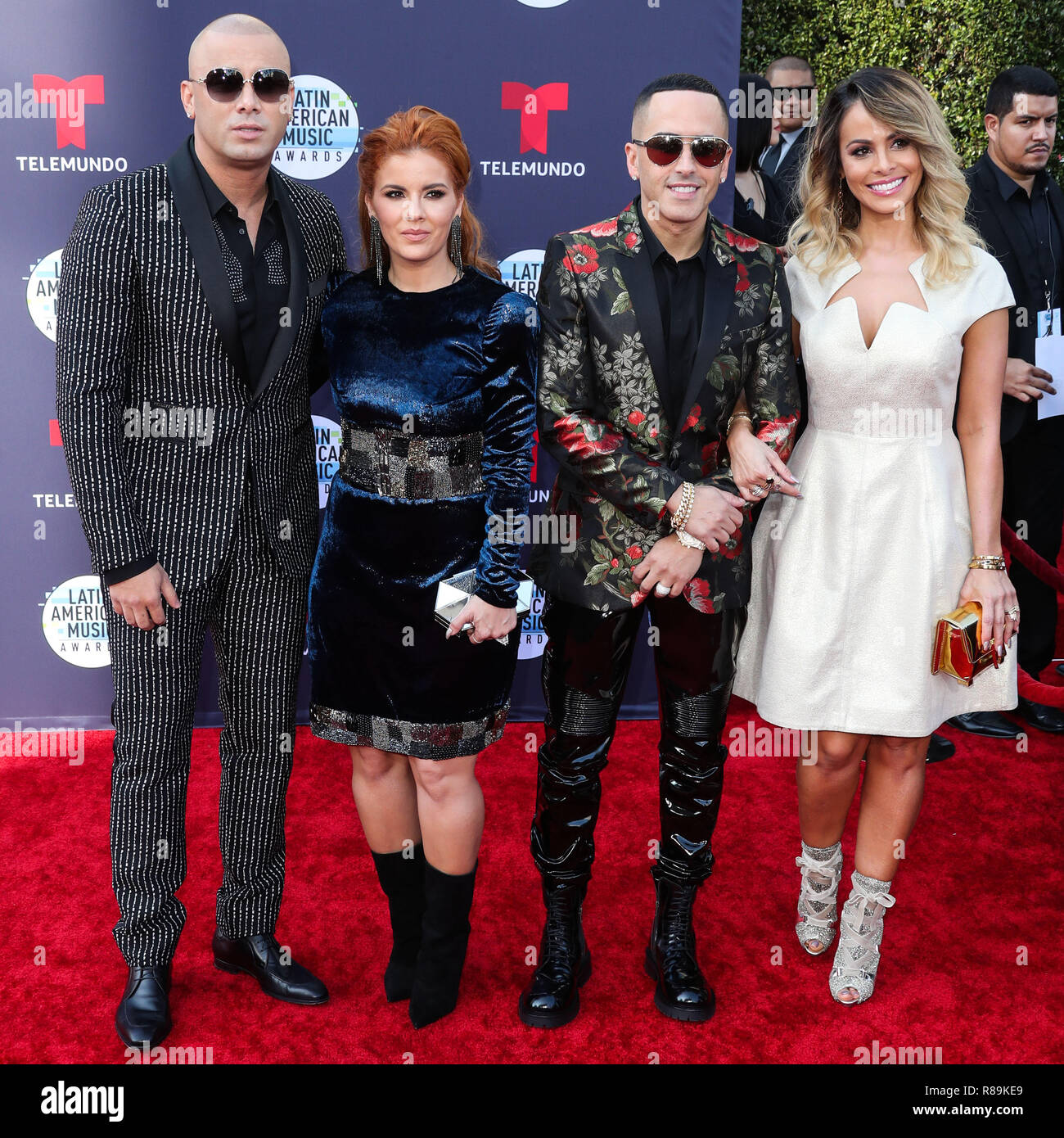 HOLLYWOOD, LOS ANGELES, CA, USA - OCTOBER 25: Yomaira Ortiz Feliciano, Wisin, Yandel, Edneris Espada Figueroa, Wisin Y Yandel at the 2018 Latin American Music Awards held at the Dolby Theatre on October 25, 2018 in Hollywood, Los Angeles, California, United States. (Photo by Xavier Collin/Image Press Agency) Stock Photo