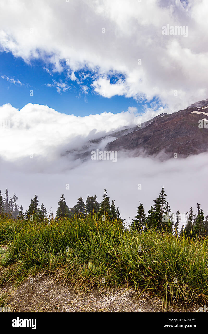 blue skys behind the mountian and clouds Stock Photo - Alamy