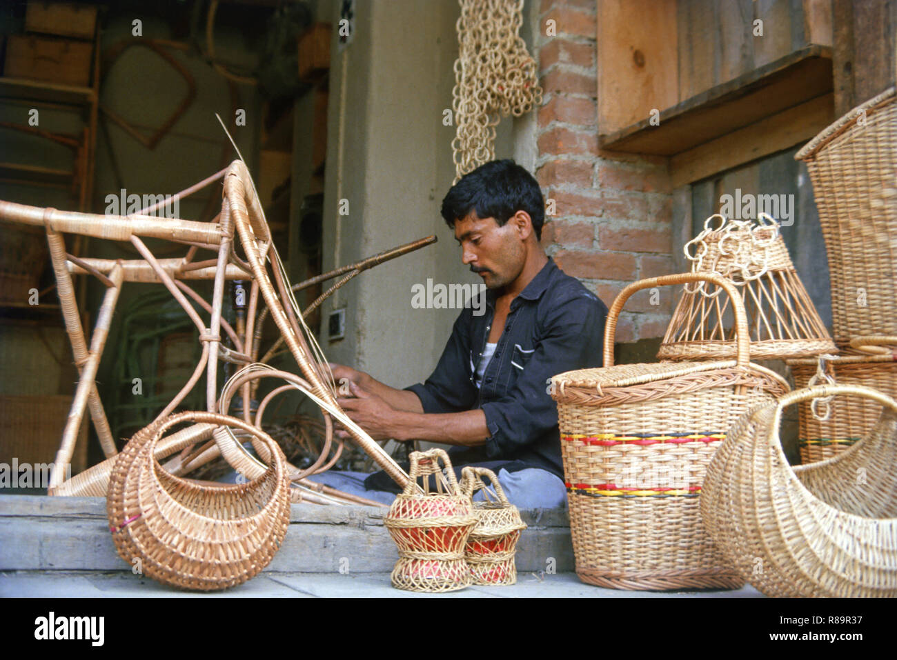 man making baskets, india Stock Photo