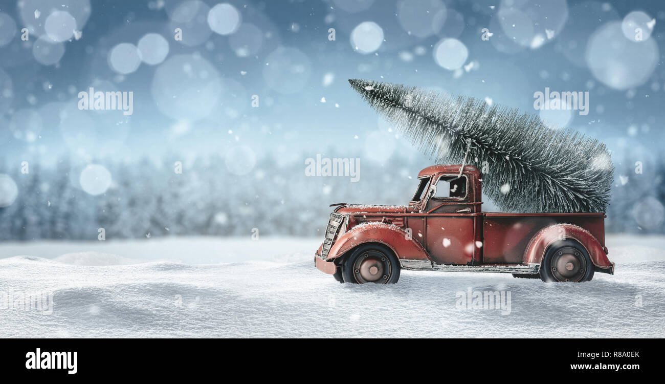 toy red truck with christmas tree