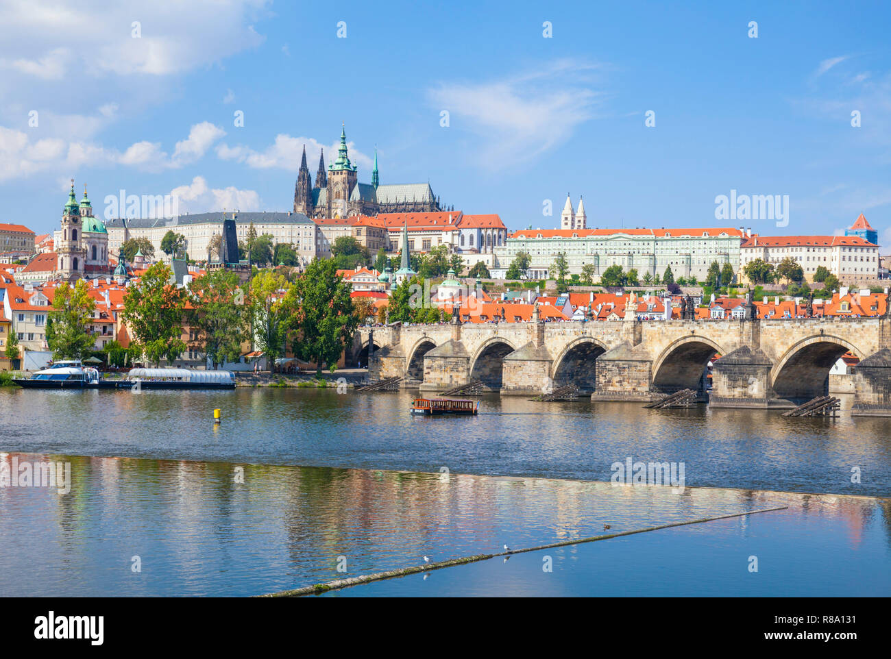 Prague skyline with Prague castle st vitus cathedral Prague Parliament buildings Charles bridge over the river Vltava Prague Czech Republic Europe Stock Photo