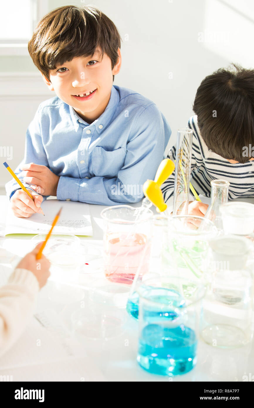 School child science beaker hi-res stock photography and images - Alamy