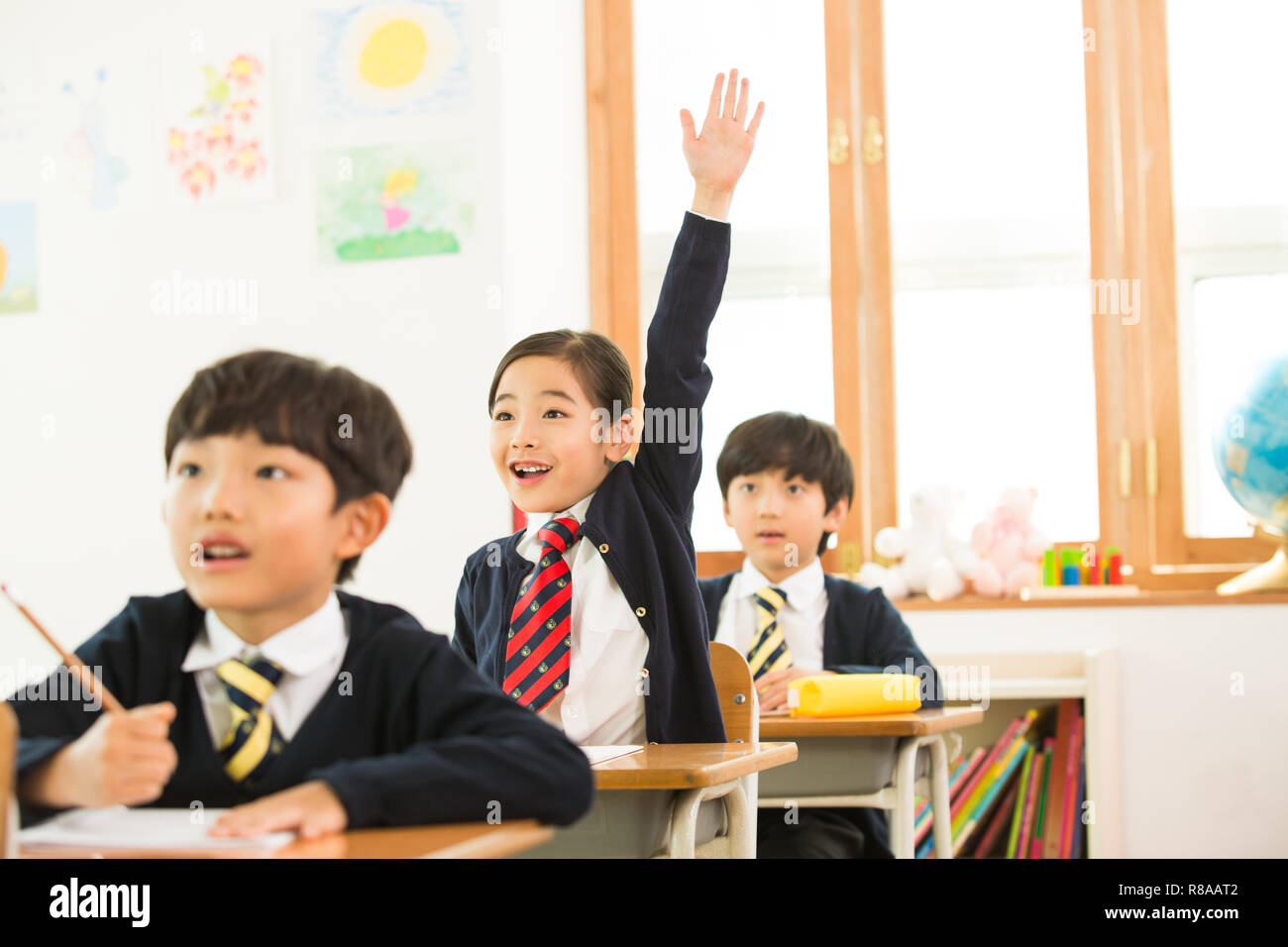 Young Students In Class Wearing Uniforms Stock Photo Alamy