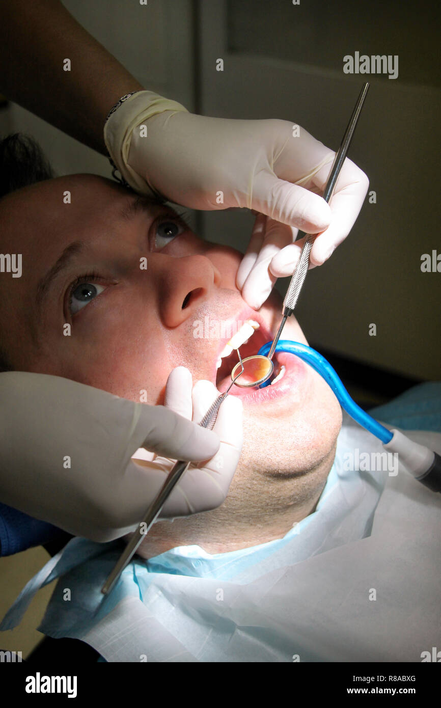 Dental check up. Dental checkup with dental tools probe, mirror and