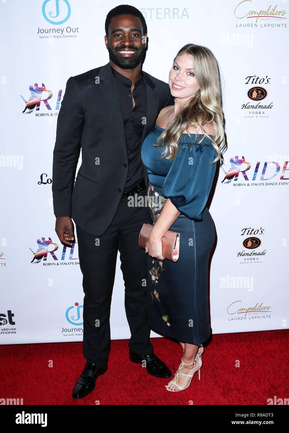 SANTA MONICA, LOS ANGELES, CA, USA - SEPTEMBER 29: Keo Motsepe, Evanna  Lynch at the RIDE Foundation's 2nd Annual Dance For Freedom held at The  Broad Stage on September 29, 2018 in