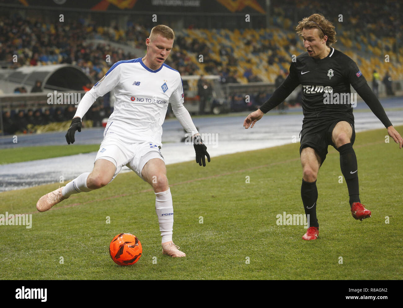 Kiev, Ukraine. 13th Dec, 2018. Mykyta Burda ( L) of Dynamo and Milos KratochvÃ-l (R ) of Jablonec are seen in action during the UEFA Europa League Group K soccer match between FC Dynamo Kiev and FK Jablonec at the NSK Olimpiyskiy in Kiev. Credit: Vadim Kot/SOPA Images/ZUMA Wire/Alamy Live News Stock Photo