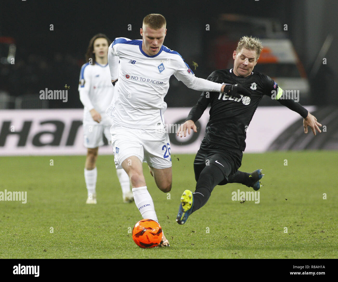 Kiev, Ukraine. 13th Dec, 2018. Mykyta Burda ( L) of Dynamo and Tomas Hubschman (R ) of Jablonec are seen in action during the UEFA Europa League Group K soccer match between FC Dynamo Kiev and FK Jablonec at the NSK Olimpiyskiy in Kiev. Credit: Vadim Kot/SOPA Images/ZUMA Wire/Alamy Live News Stock Photo