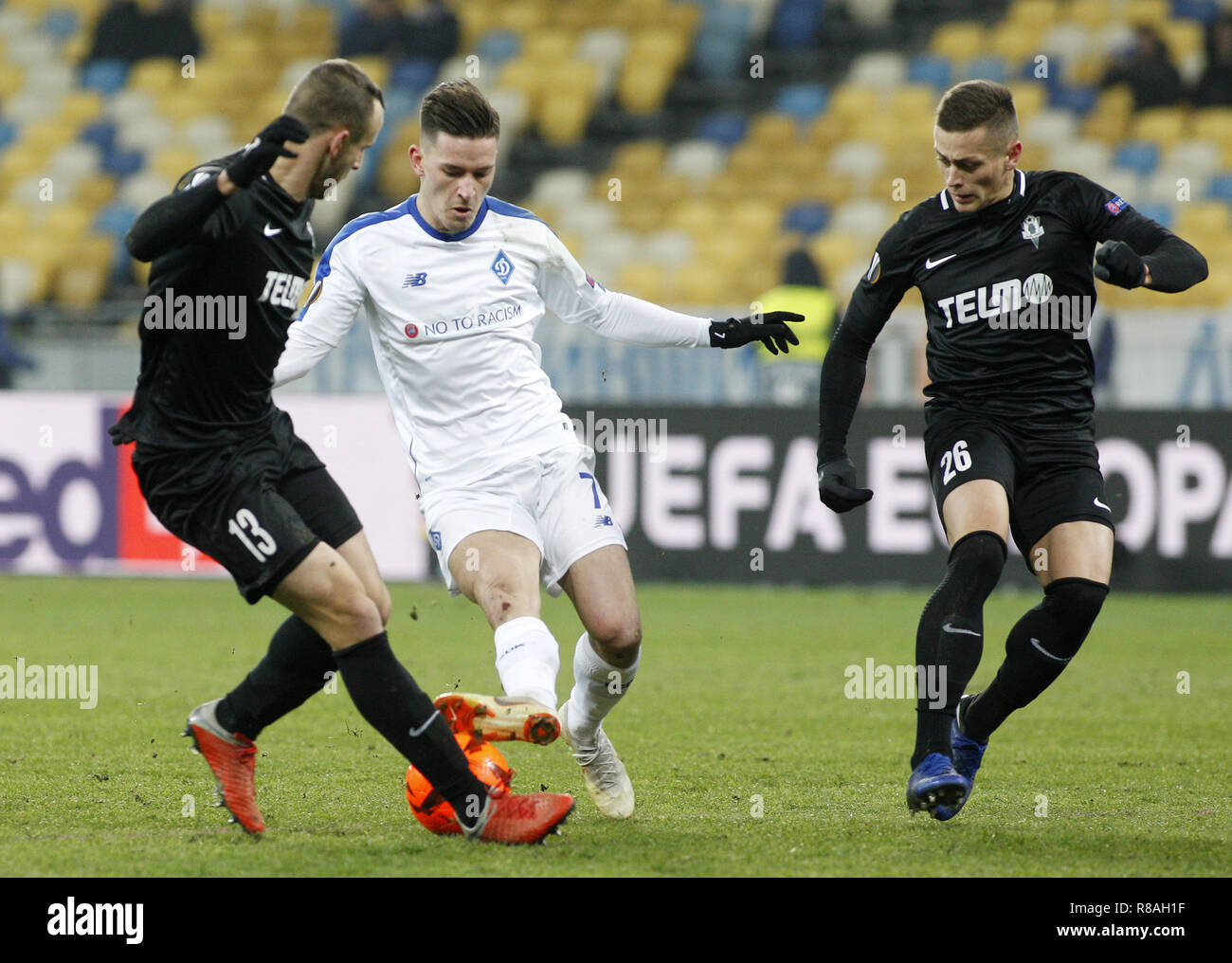 Kiev, Ukraine. 13th Dec, 2018. Benjamin Verbic (C) of Dynamo, David Lischka (L) and Tomas Holes(R) of Jablonec are seen in action during the UEFA Europa League Group K soccer match between FC Dynamo Kiev and FK Jablonec at the NSK Olimpiyskiy in Kiev. Credit: Vadim Kot/SOPA Images/ZUMA Wire/Alamy Live News Stock Photo