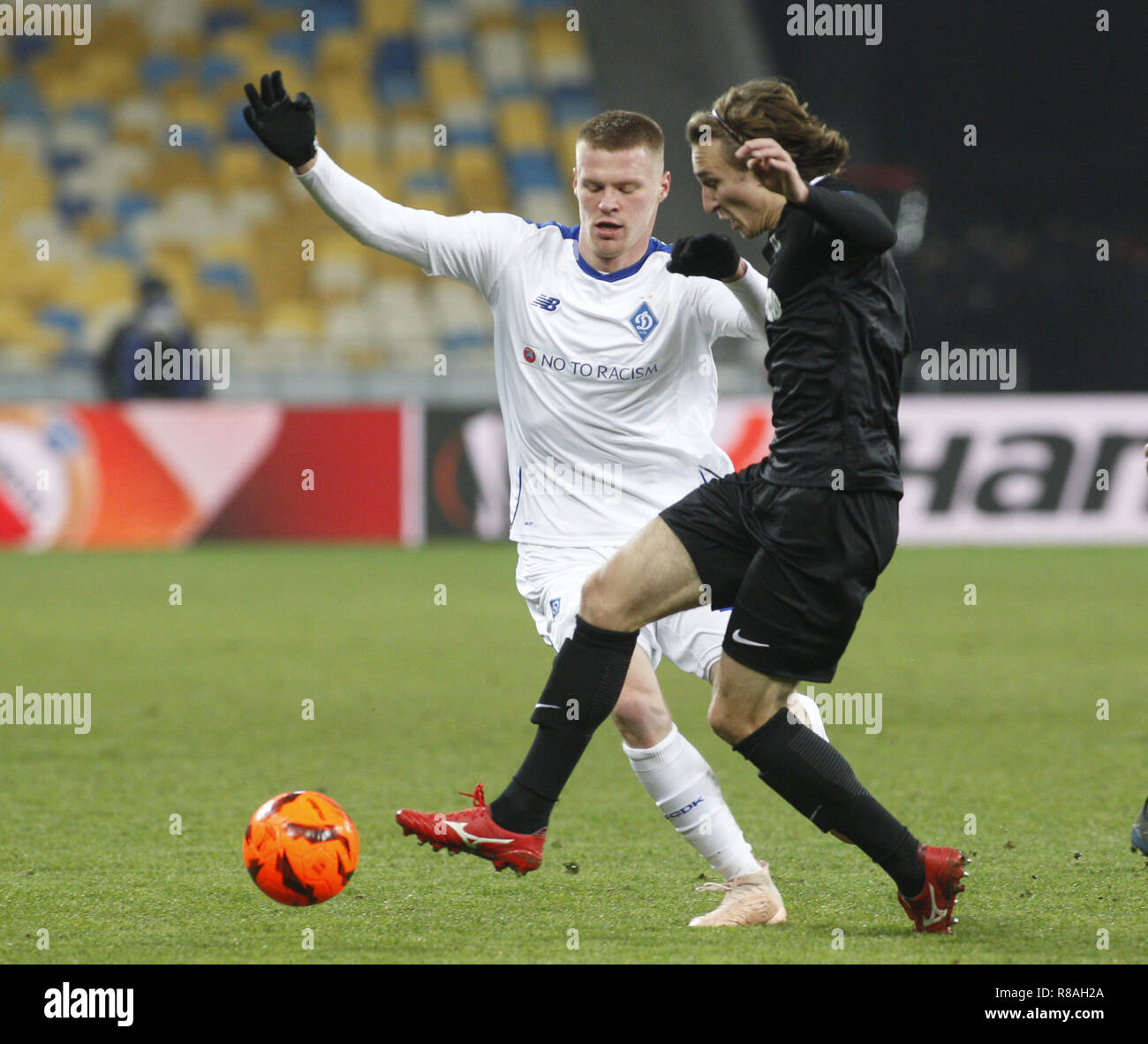 Kiev, Ukraine. 13th Dec, 2018. Mykyta Burda ( L) of Dynamo and Milos KratochvÃ-l (R ) of Jablonec are seen in action during the UEFA Europa League Group K soccer match between FC Dynamo Kiev and FK Jablonec at the NSK Olimpiyskiy in Kiev. Credit: Vadim Kot/SOPA Images/ZUMA Wire/Alamy Live News Stock Photo