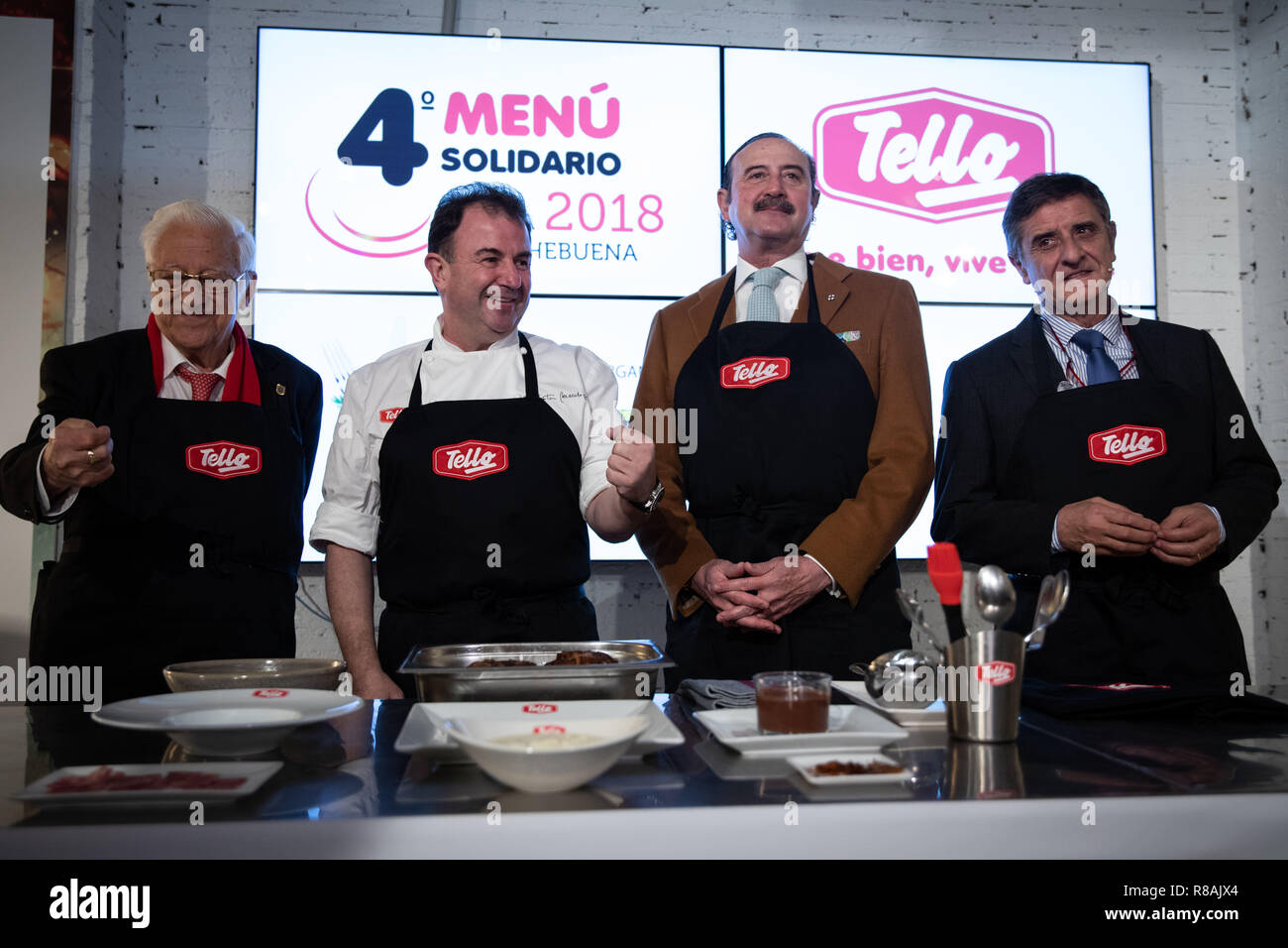 Madrid, Spain. 14th December, 2018. FATHER ANGEL, president of the NGO Mensajeros de la Paz(left), MARTIN BERASATEGUI, chef with 10 Michelin stars, DR MANUEL DE LA TORRE, President of the Foundation of Dr Manuel de la Torre and ALFONSO ALCAZAR, General Director of the Tello Alimentación Group. Presentation of the Menus Solidarios 2018 that will be offered to 250 people without resources at the Christmas Eve Dinner of Messengers of Peace and are prepared by Martín Berasategui on Dec 14, 2018 in Madrid, Spain Credit: Jesús Hellin/Alamy Live News Stock Photo