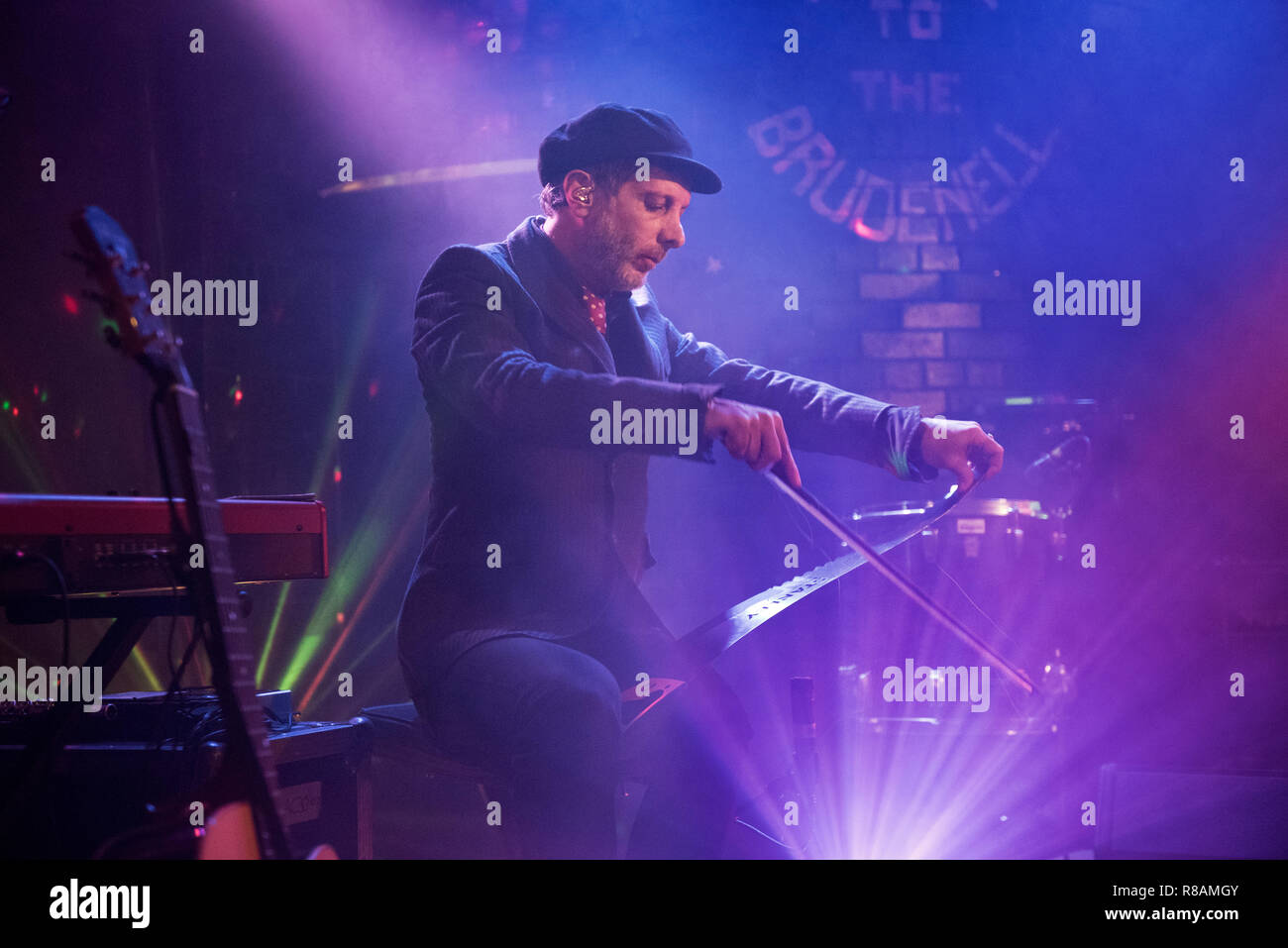 Leeds, UK. 13th Dec 2018. American rock band Mercury Rev in concert at Brudenell Social Club, Leeds, UK, 13 December 2018. Jonathan Donahue plays the musical saw during the gig. Credit: John Bentley/Alamy Live News Stock Photo