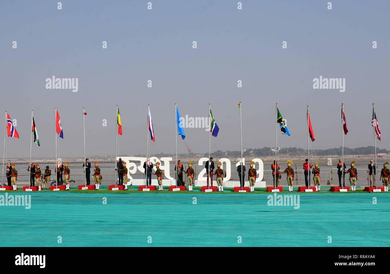 Allahabad, Uttar Pradesh, India. 15th Dec, 2018. Allahabad: Head of missions of 71 country host their country's flag during a programme as they visit kumbh at Arail in Allahabad on 15-12-2018. Credit: Prabhat Kumar Verma/ZUMA Wire/Alamy Live News Stock Photo