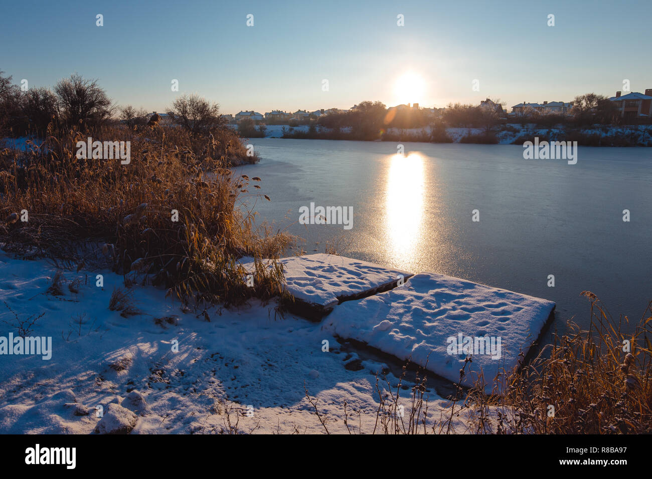 Frozen lake at winter. Early morning light. Stock Photo