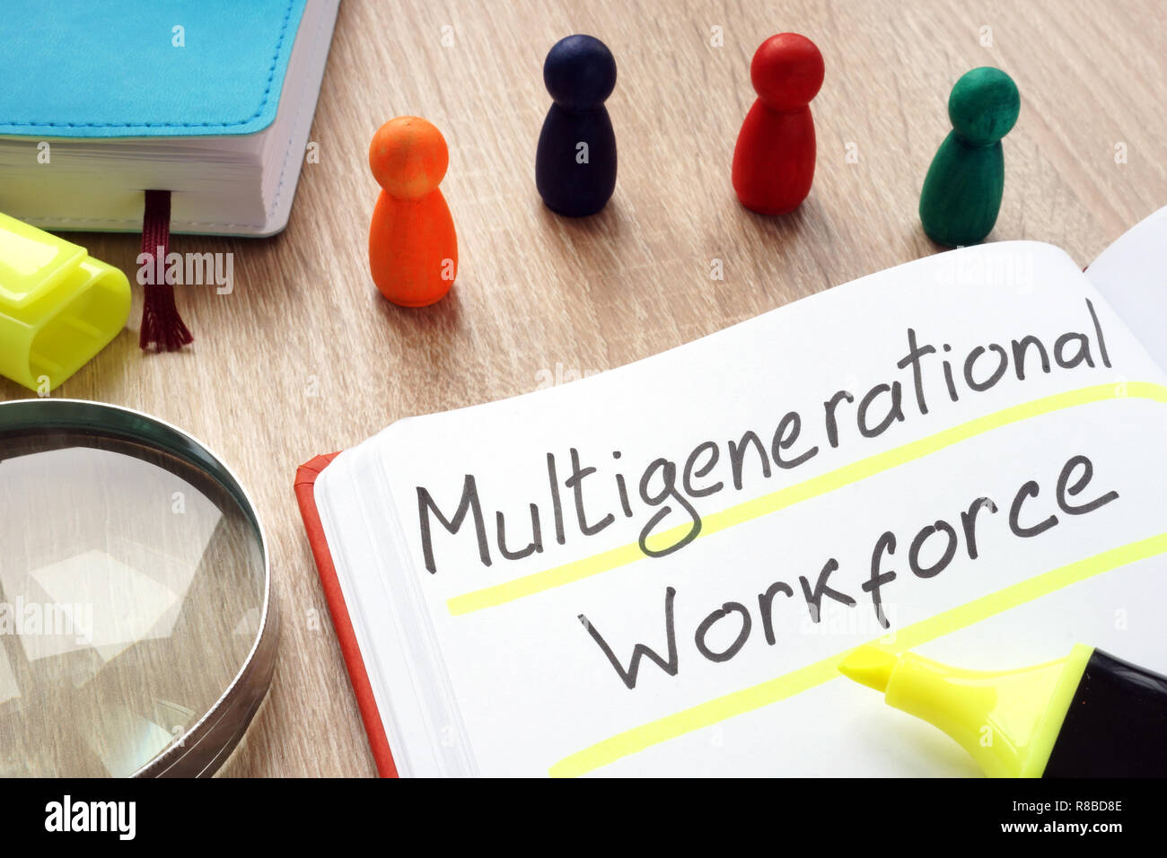 Multigenerational workforce written by pen on a note. Stock Photo