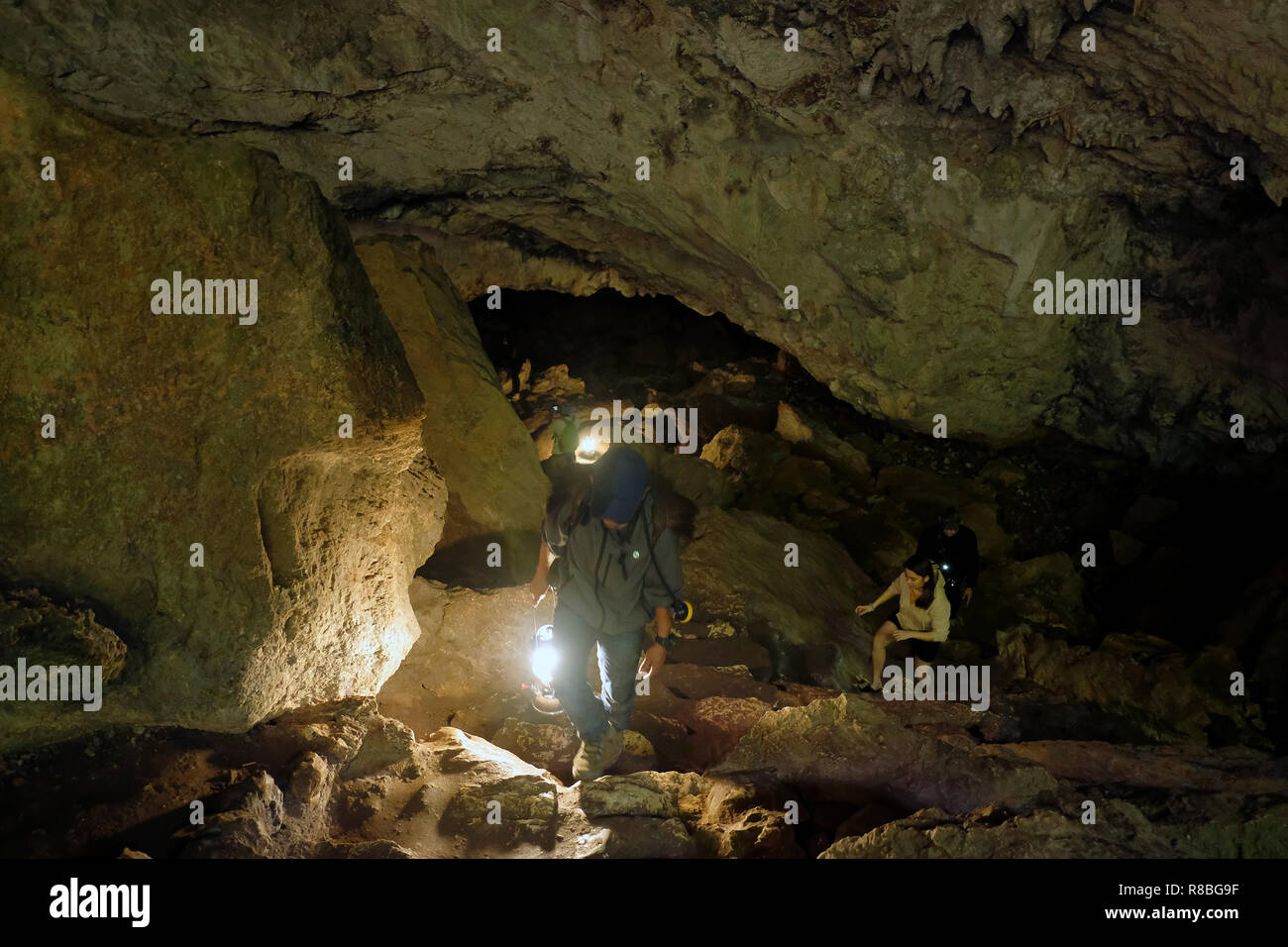 Hikers inside Sumaguing Cave the deepest cave in the Philippines with a