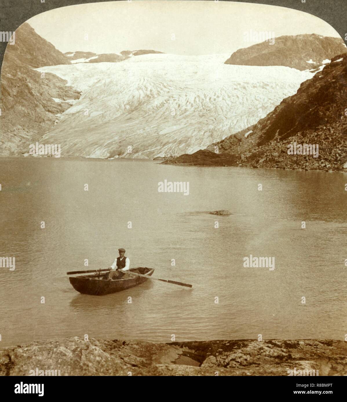 'Stream of solid ice (Hardanger glacier) and lake where it melts, Norway', c1905. Creator: Unknown. Stock Photo