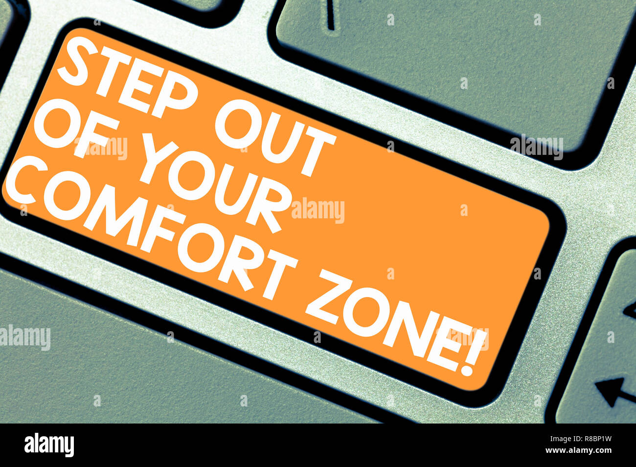 Word writing text Step Out Of Your Comfort Zone. Business concept for Do different things leave the routine Keyboard key Intention to create computer Stock Photo