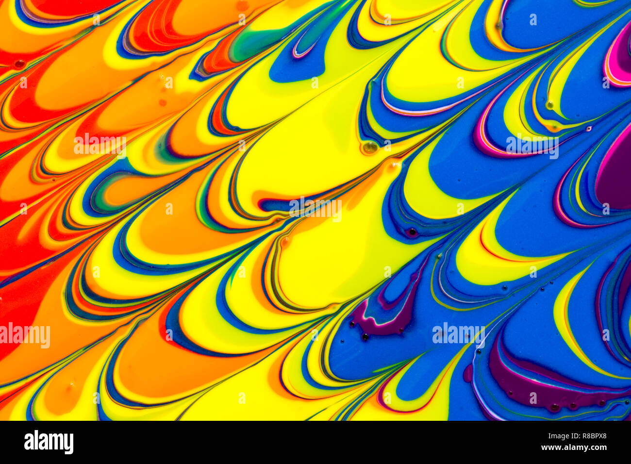 A colourful multicoloured rainbow abstract background of red, orange, yellow,  green. blue, purple, pink and white liquid paint swirls Stock Photo - Alamy