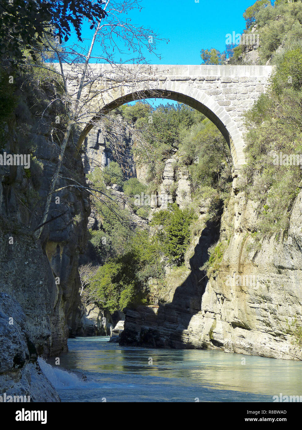 Antique Oluk Bridge across Kopru Irmagi creek in Koprulu Kanyon national park in Turkey. Stock Photo