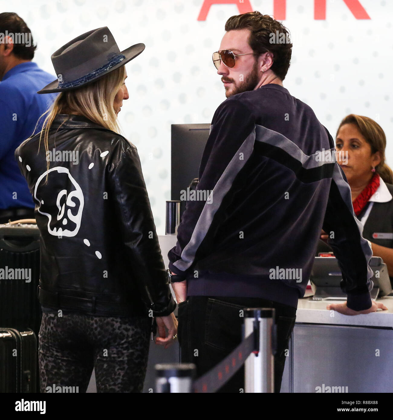 LOS ANGELES, CA, USA - SEPTEMBER 05: Aaron Taylor-Johnson and Sam Taylor-Johnson seen at Los Angeles International Airport (LAX) on September 5, 2018 in Los Angeles, California, United States. (Photo by Image Press Agency) Stock Photo