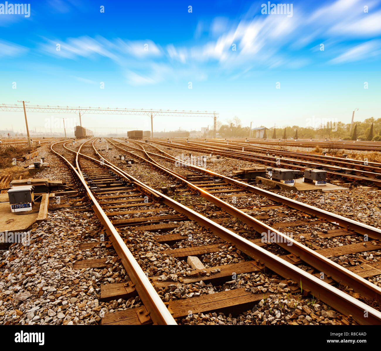 Rails under the sky background Stock Photo - Alamy