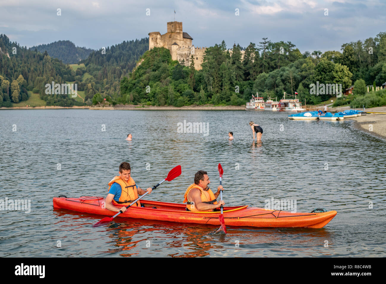 People enjoy Canoeing on lake Czorsztyn in Niedzica, Lesser Poland, Poland. Stock Photo