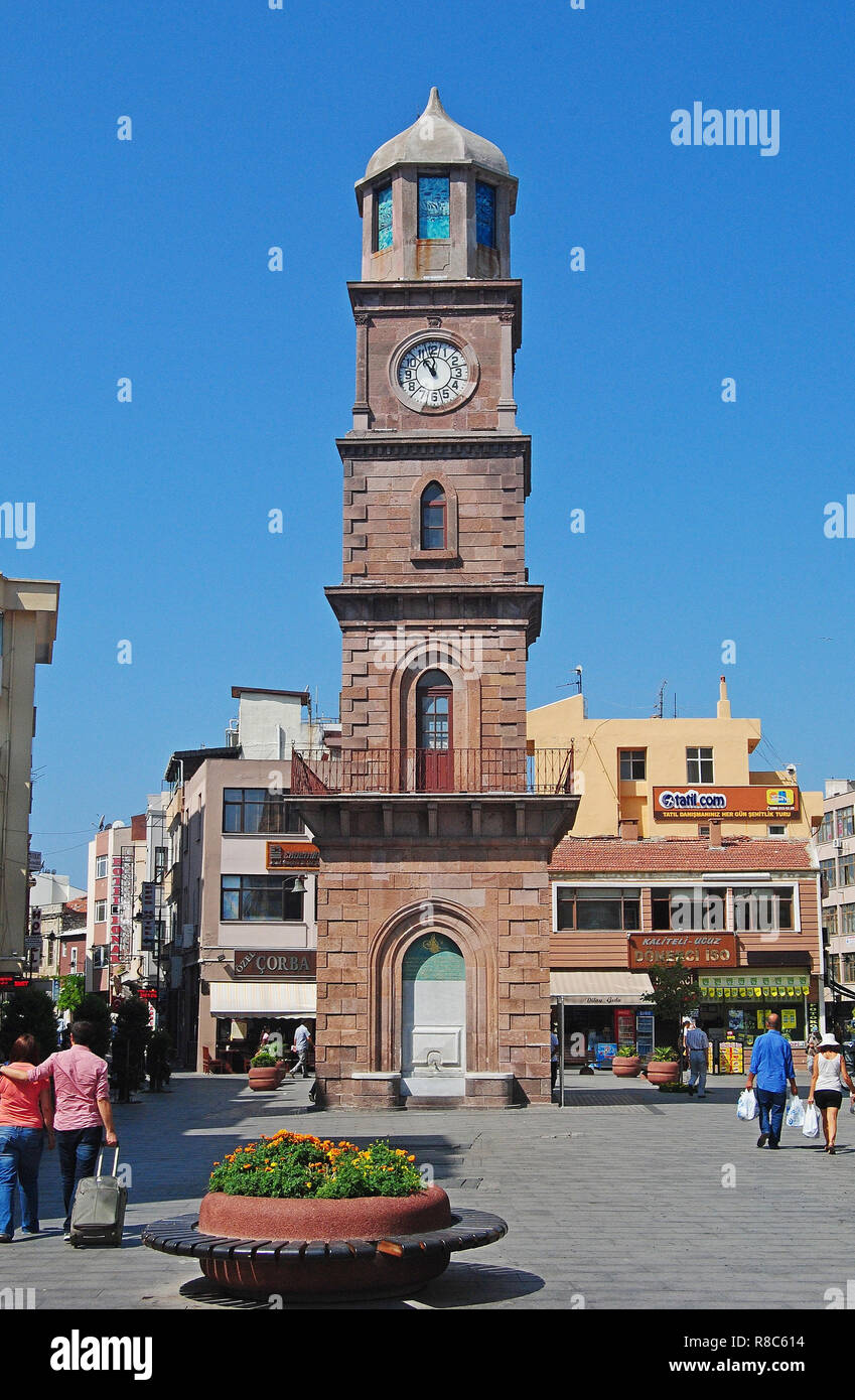 Canakkale, Turkey - August 12, 2013. Five-storey Ottoman clock tower in Canakkale, dating from 1897. View with people. Stock Photo