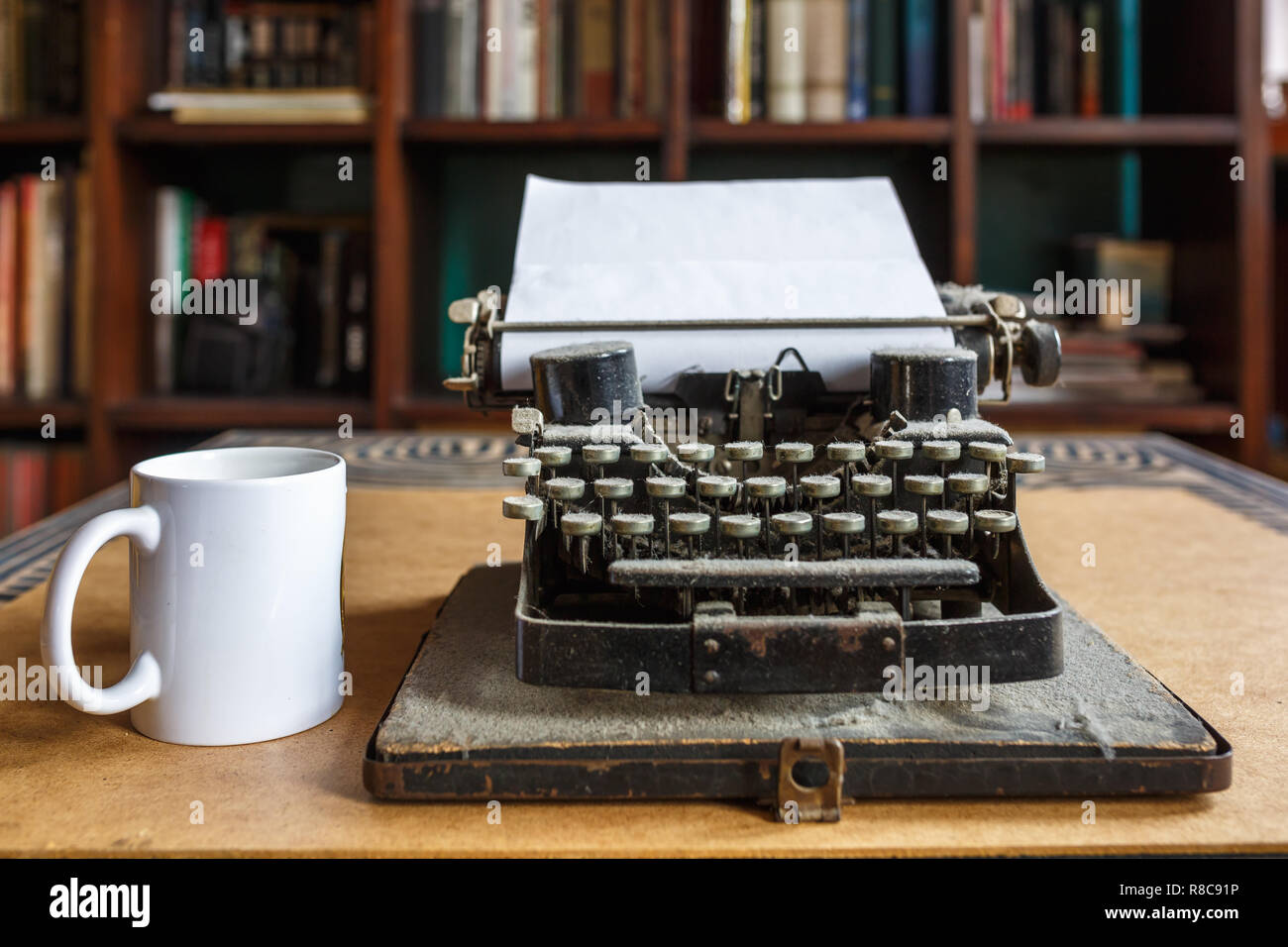 Old Vintage Dust Covered Typewriter With Sheet Of White