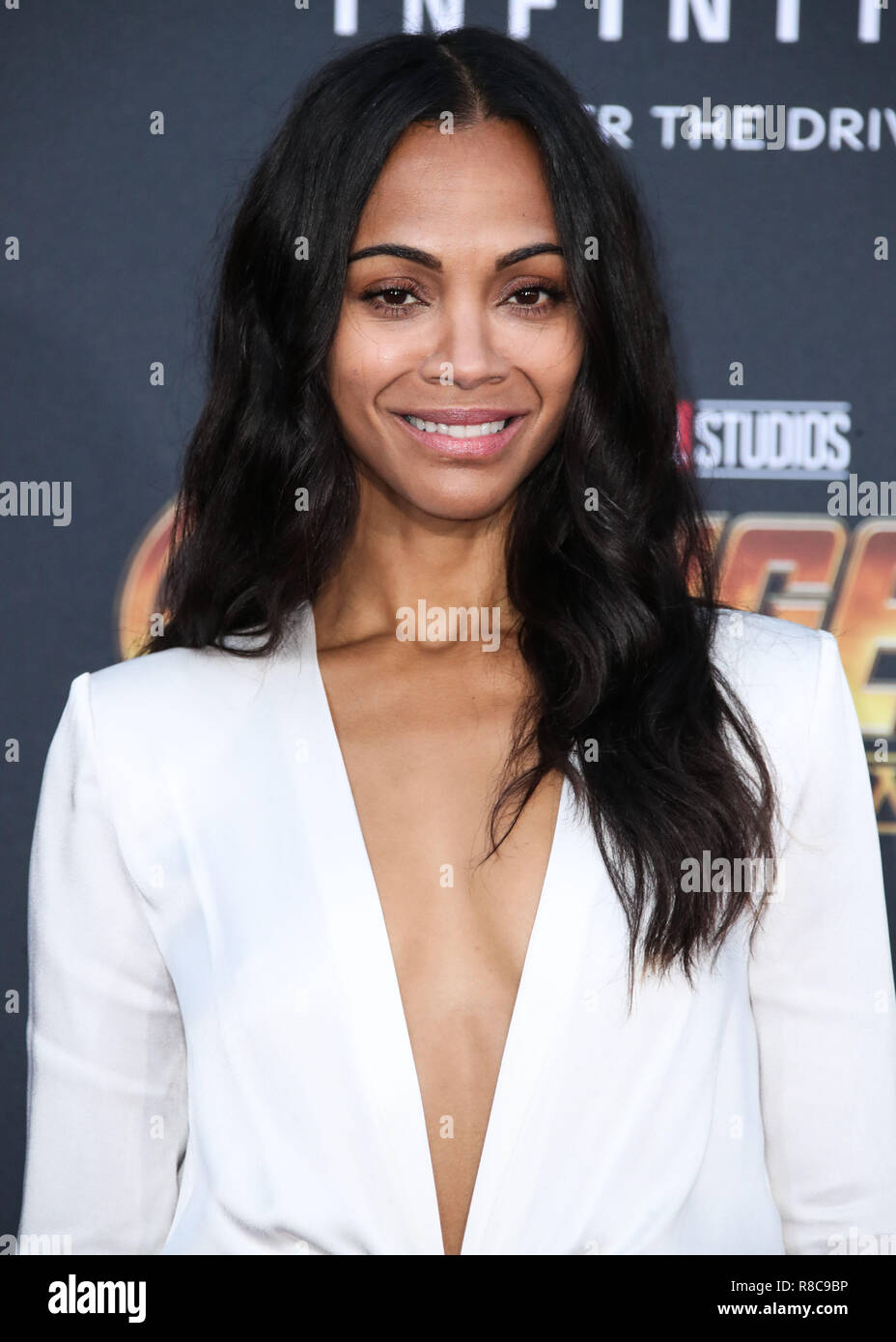 HOLLYWOOD, LOS ANGELES, CA, USA - APRIL 23: Zoe Saldana at the World Premiere Of Disney And Marvel's 'Avengers: Infinity War' held at the El Capitan Theatre, Dolby Theatre and TCL Chinese Theatre IMAX on April 23, 2018 in Hollywood, Los Angeles, California, United States. (Photo by Xavier Collin/Image Press Agency) Stock Photo