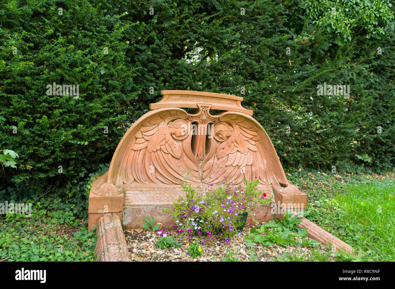 Terracotta headstone designed by Mary Watts, the wife of artist George Frederick Watts, Quinton, Northamptonshire, UK Stock Photo