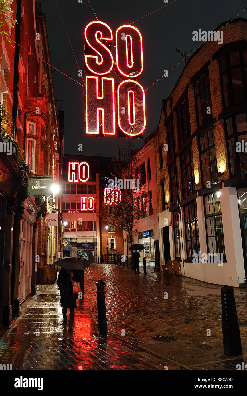 Soho Christmas lights on a wet rainy night Stock Photo Alamy