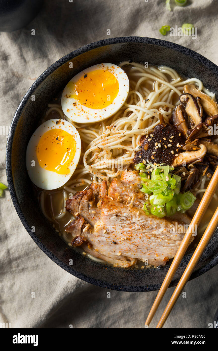 Homemade Japanese Pork Tonkotsu Ramen with Mushrooms and Eggs Stock