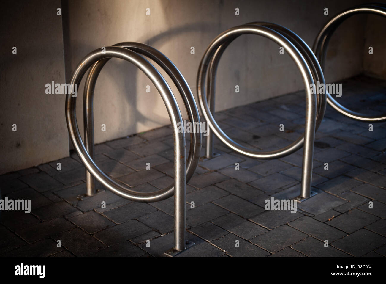 Unusual bike rack in pedestrian precinct in Bradford on Avon, Wiltshire, UK. Stock Photo